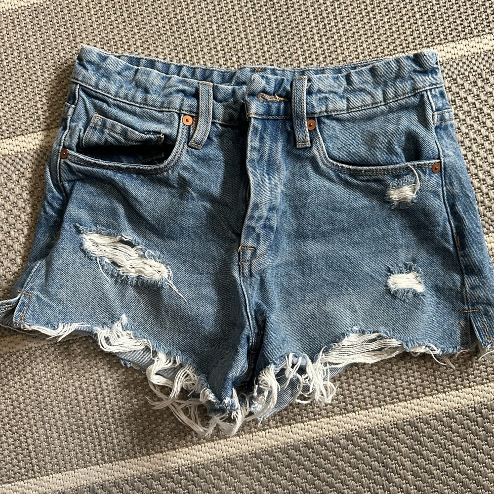 Blank NYC Blue Distressed Jean Shorts with Raw Hem